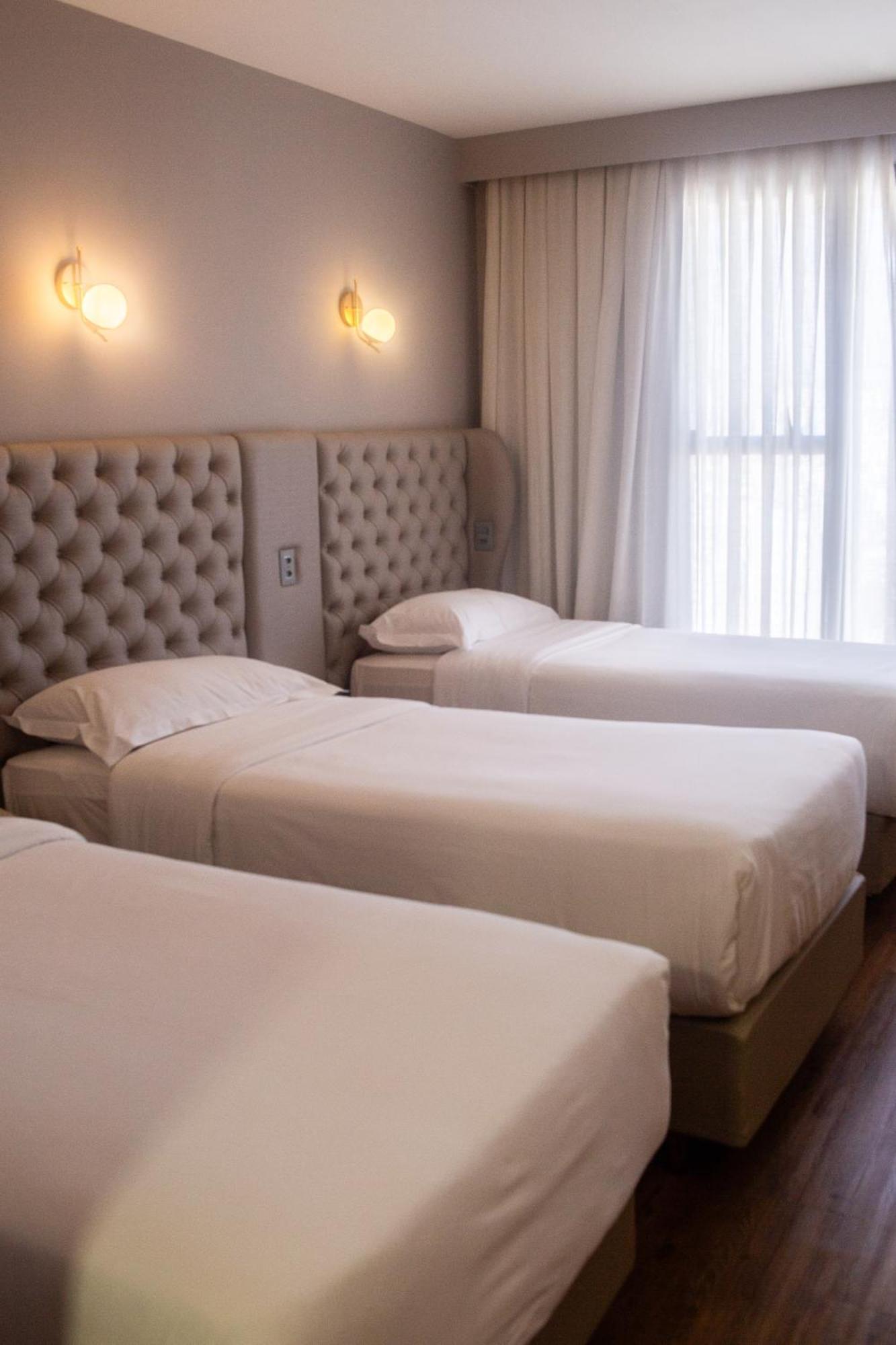 欧鲁米纳斯宫酒店 贝洛哈里桑塔 外观 照片 A room at the hotel